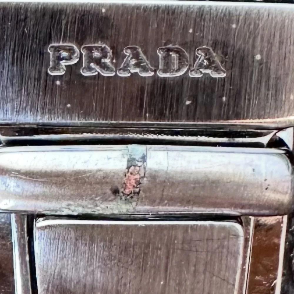 Prada Black Leather Wallet with Silver Clasp